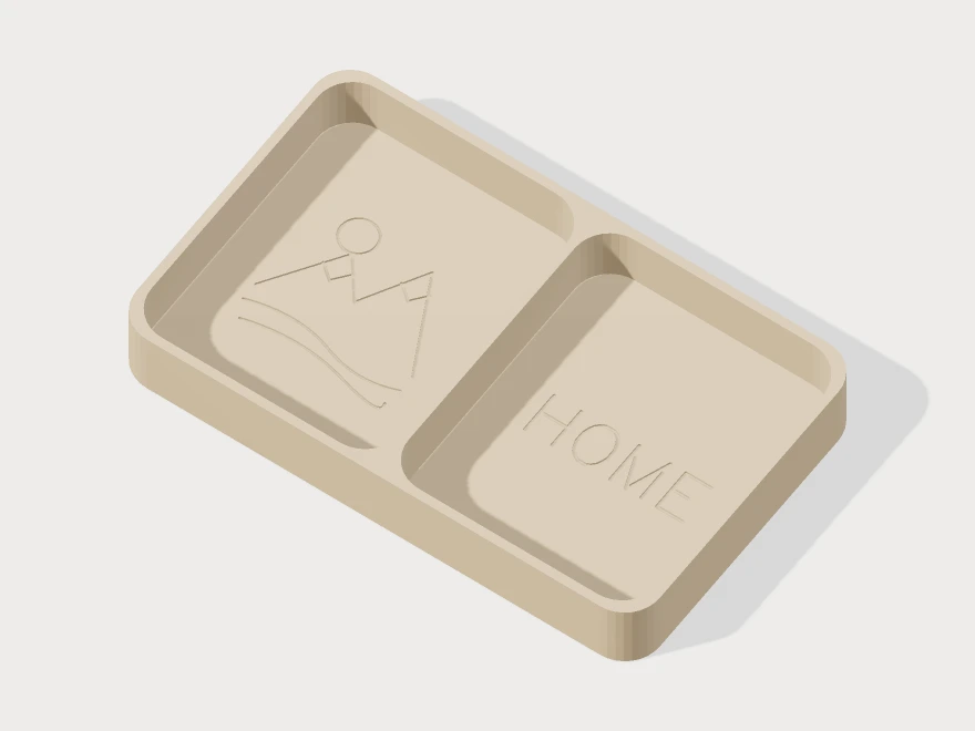 3D model preview of a rounded two-compartment tray with an engraved mountain landscape and HOME lettering